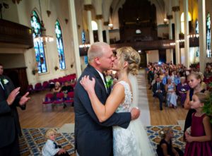 Wedding Kiss at Sacred Heart Music Center in Duluth